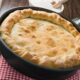 schiacciata con patate e salsiccia