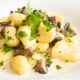 gnocchi saltati con prosciutto e funghi