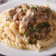 pasta con pesto di nocciole e funghi