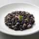 La ricetta del risotto al nero di seppia alla veneziana