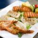 Grigliata di pesce perfetta per ferragosto? Tutti i consigli (e le ricette) da seguire