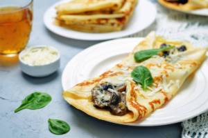 Ricetta delle crespelle ai funghi e besciamella: impossibile resistere!