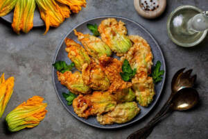 Fiori di zucca gratinati, croccanti e saporiti